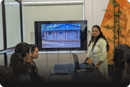 Poonam is giving presentation on Warli Art